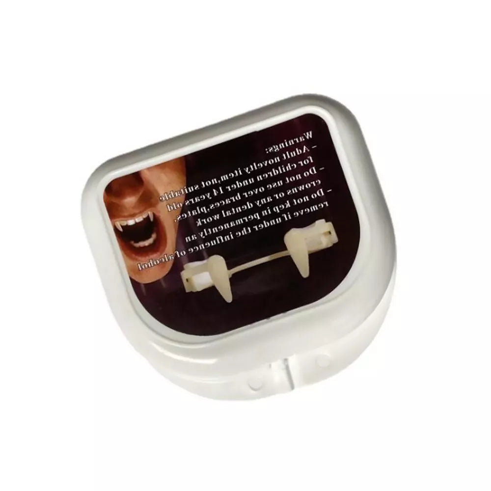 Professional-grade retractable vampire fangs displayed against dark background, showing realistic pointed design and natural-looking translucent finish for theatre and cosplay use